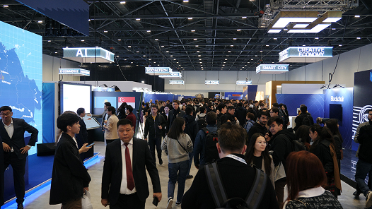 Visitors on the exhibition floor of a semiconductor industry trade show